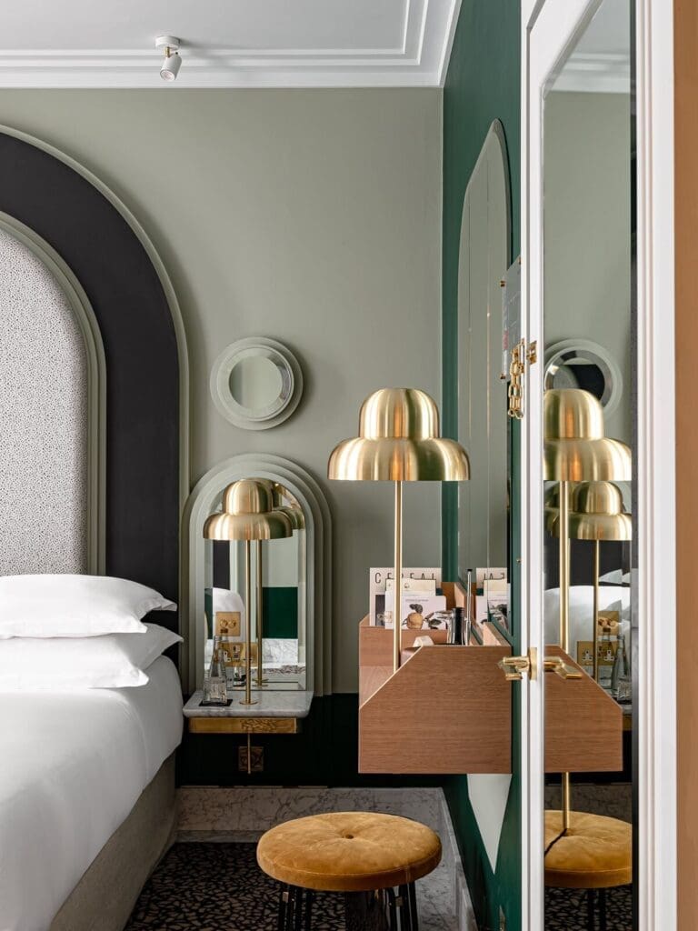 Henrietta Hotel bedroom with crisp linens and calm styling — cosy girls weekend stay in central London