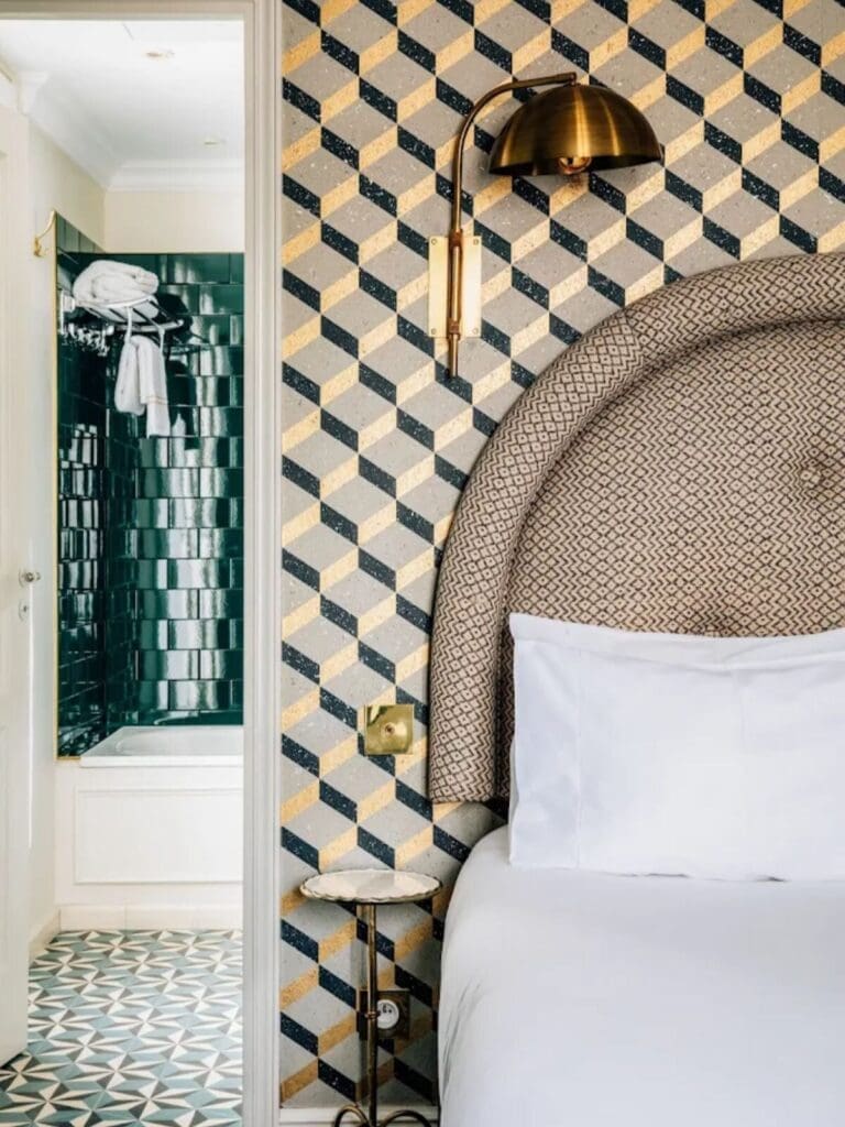 Guest room at Grand Pigalle Hôtel, Paris – cosy boutique bedroom with design-led details.