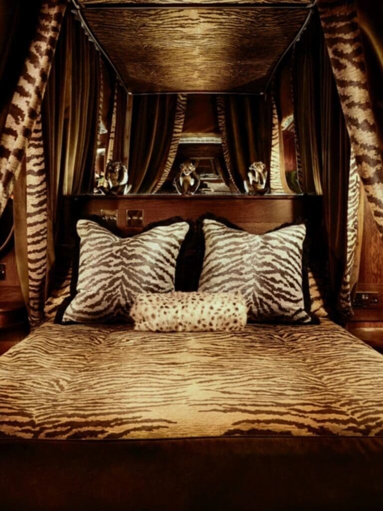 Moody bedroom with four-poster drama — a main-character stay for a Glasgow hen night.