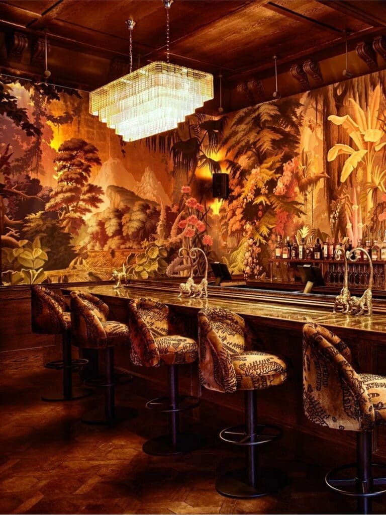 Velvet-lit cocktail lounge — the perfect warm-up spot for a glamorous girls’ weekend
