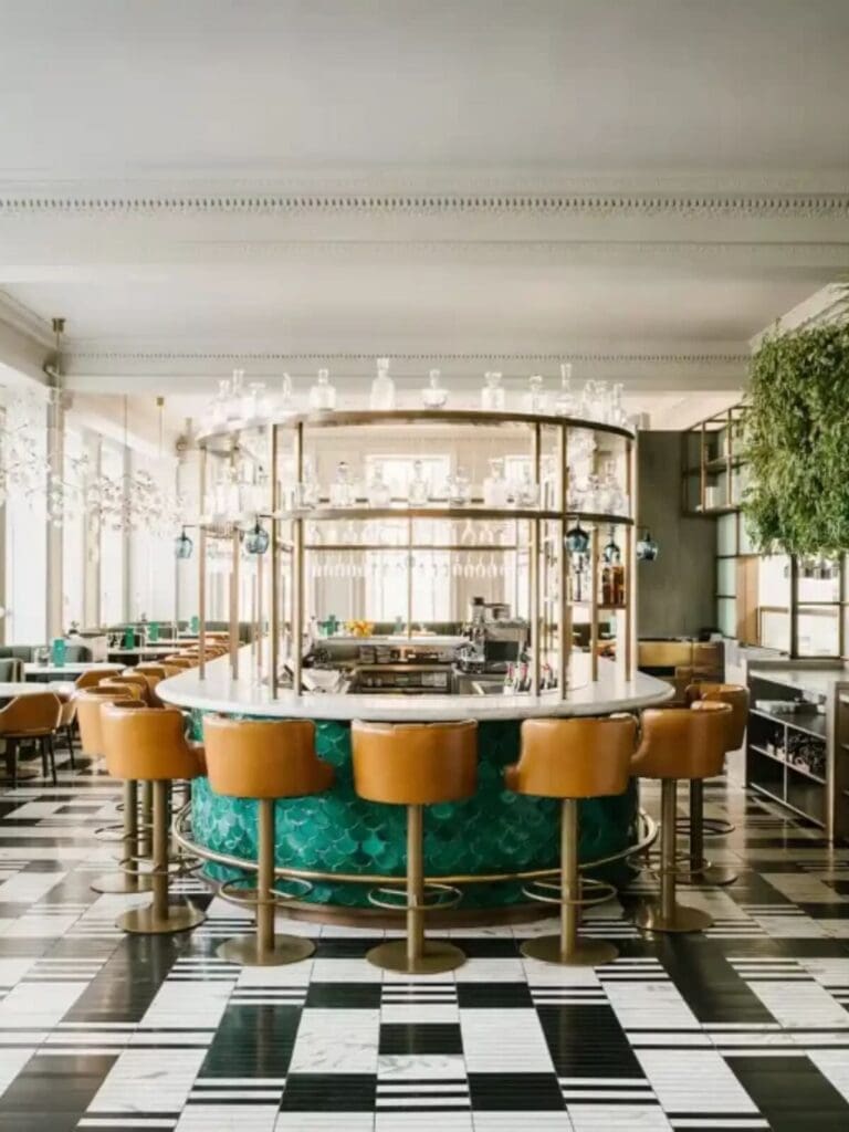 Elegant Kimpton Blythswood Square lobby with high ceilings and plush seating — the calm start to a girls’ weekend in Glasgow.