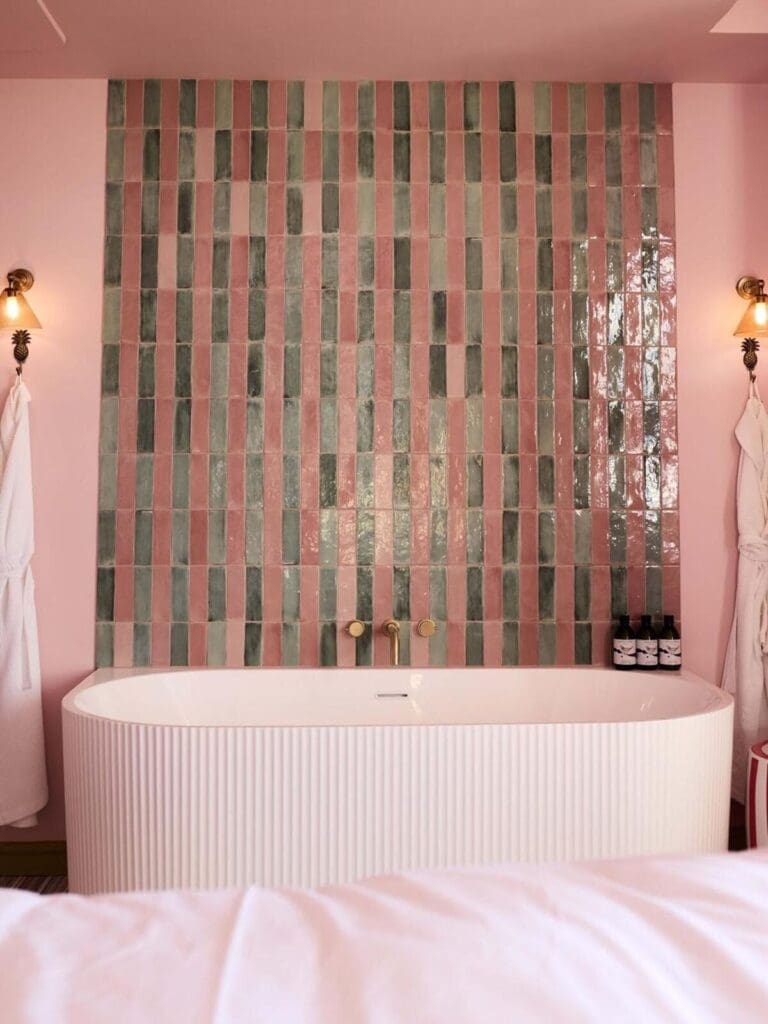 Luxury bathroom at Drakes Hotel Brighton with large bath and fluffy towels, perfect for a hen weekend reset.