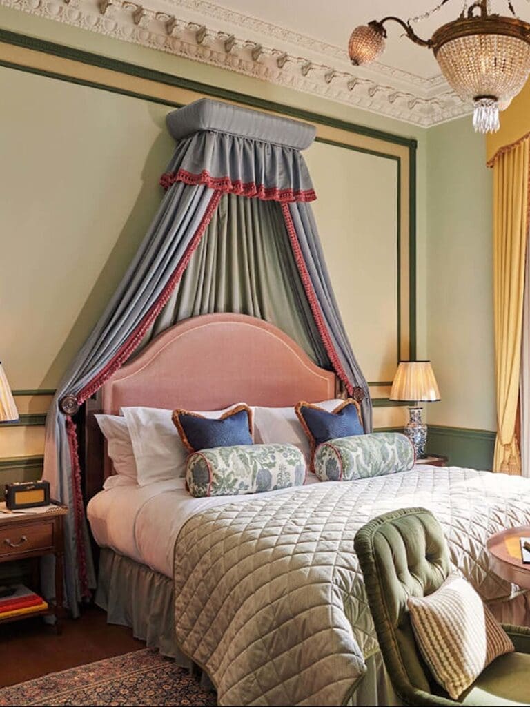 Cosy boutique bedroom at Gleneagles Townhouse with soft lighting and crisp linens for an elevated hen weekend stay