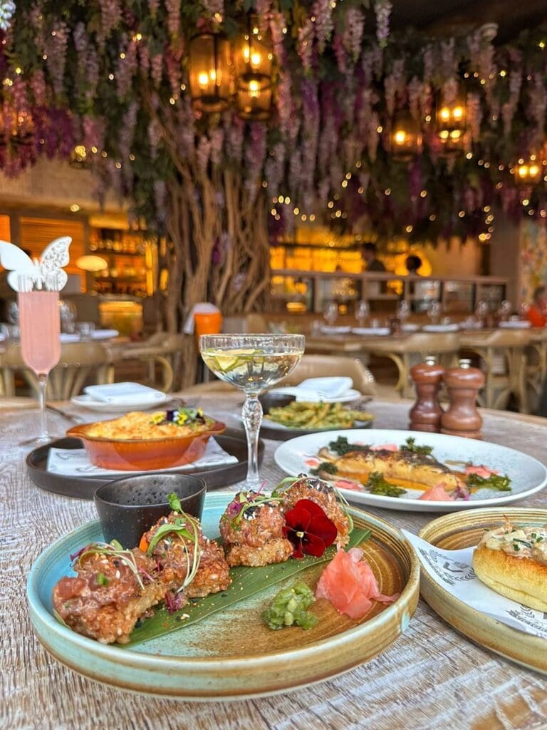 Brunch small plates with a side and glasses of rosé prosecco on a Quayside table for a Newcastle hen weekend.