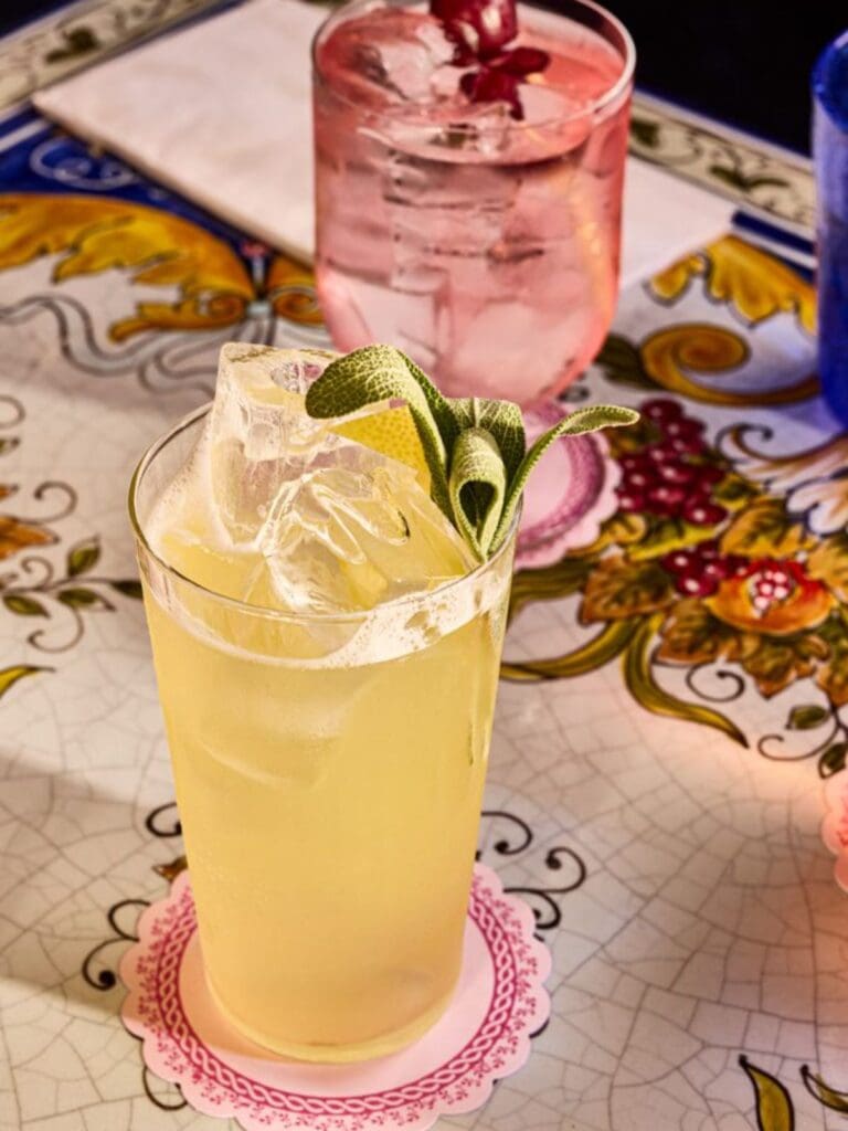 Patatino at The Hoxton boozy brunch with Italian plates and spritzes on the table, stylish hotel restaurant backdrop, girls’ weekend-approved.