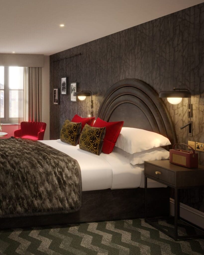 Hotel Gotham Newcastle bedroom with dark, dramatic styling — Gatsby-ish base for a big-night girls’ trip.