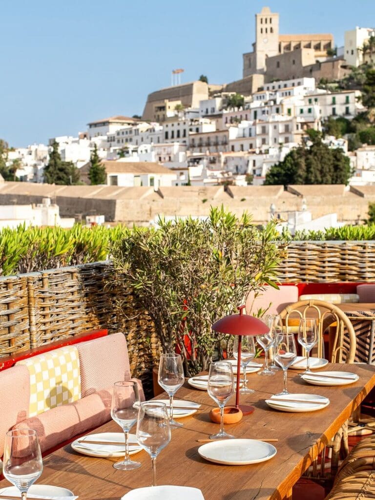 Brunch table at Café Montesol in Ibiza with pancakes, avocado toast, coffee and fresh juices, relaxed girls’ trip energy. 