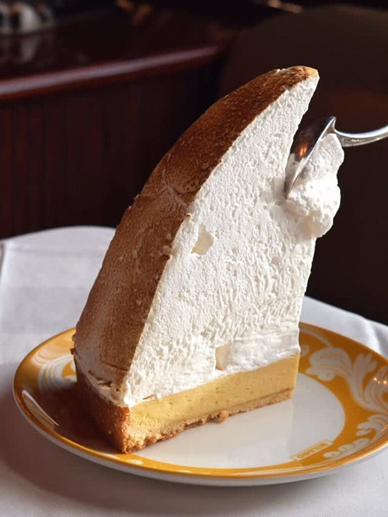 Gloria Osteria Dublin viral lemon meringue pie with towering toasted meringue and thick lemon curd on a biscuit base