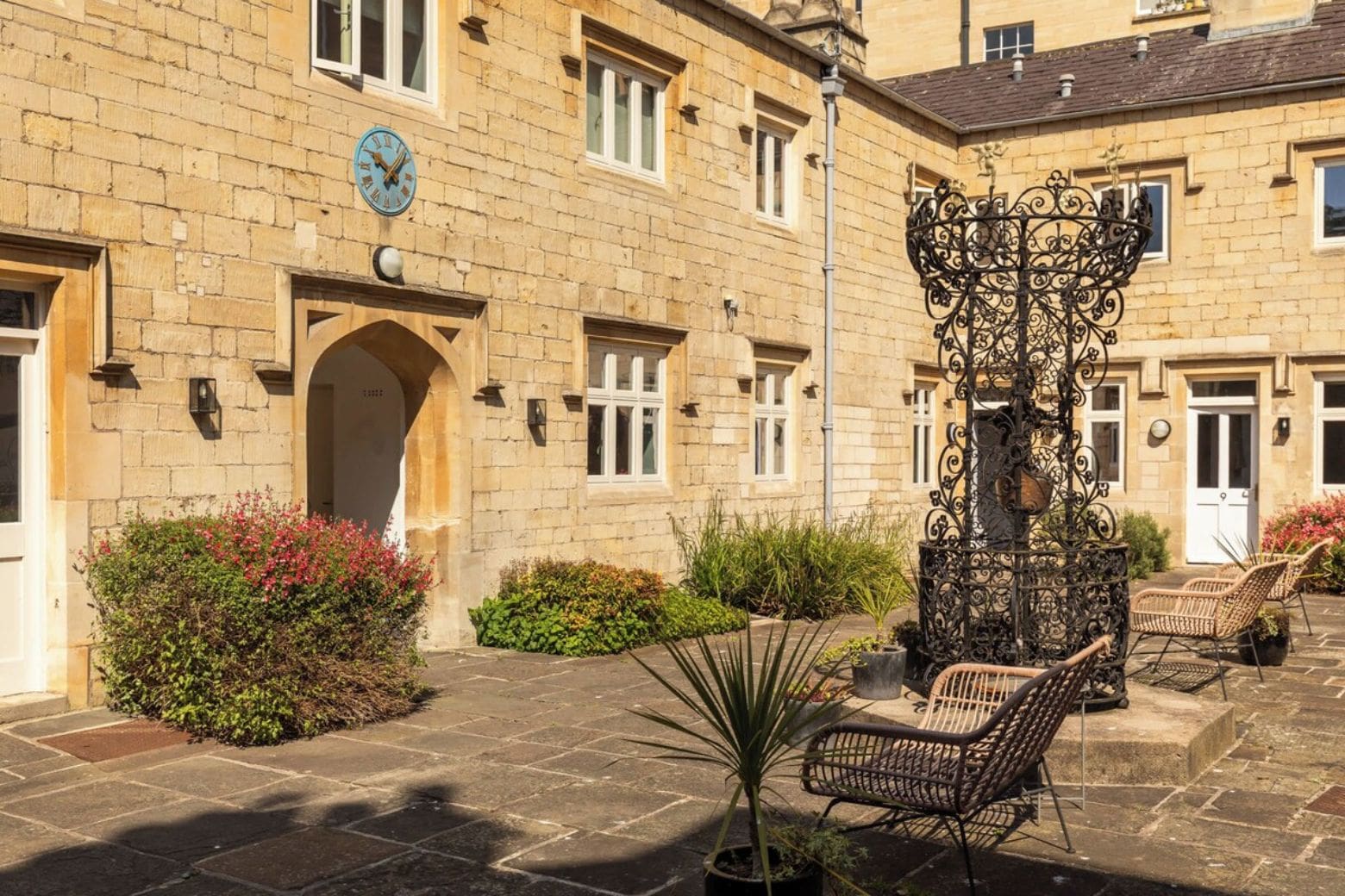 Quiet courtyard of private apartments with shared outdoor space in Airbnbs in Bath for a hen weekend.