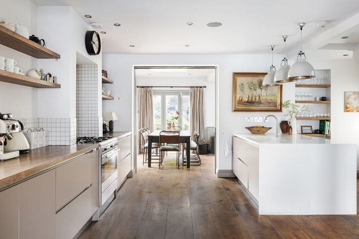 Stylish open-plan kitchen and dining space at Bristol Gardens Brighton, perfect for group stays and hen weekends