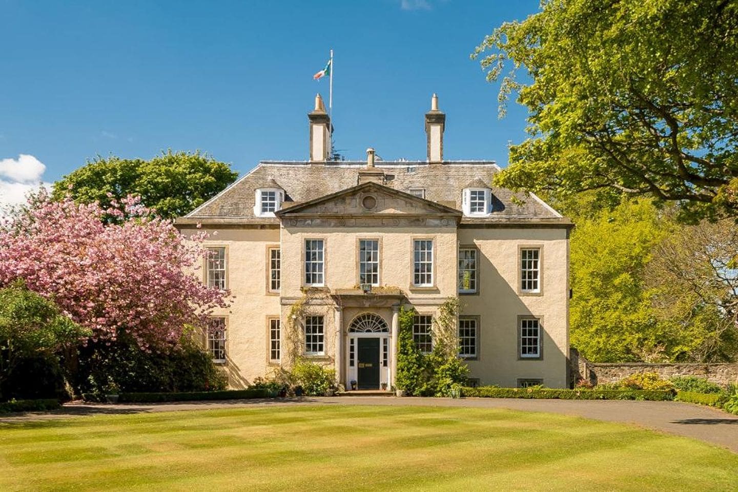 Grand historic mansion exterior of Drylaw House Edinburgh set within private gardens, perfect for large group and hen weekend stays