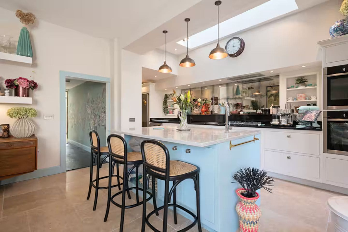 Bright open-plan kitchen at Eskbank Villa near Edinburgh with large island, bar seating and skylight, perfect for hen weekends in Edinburgh