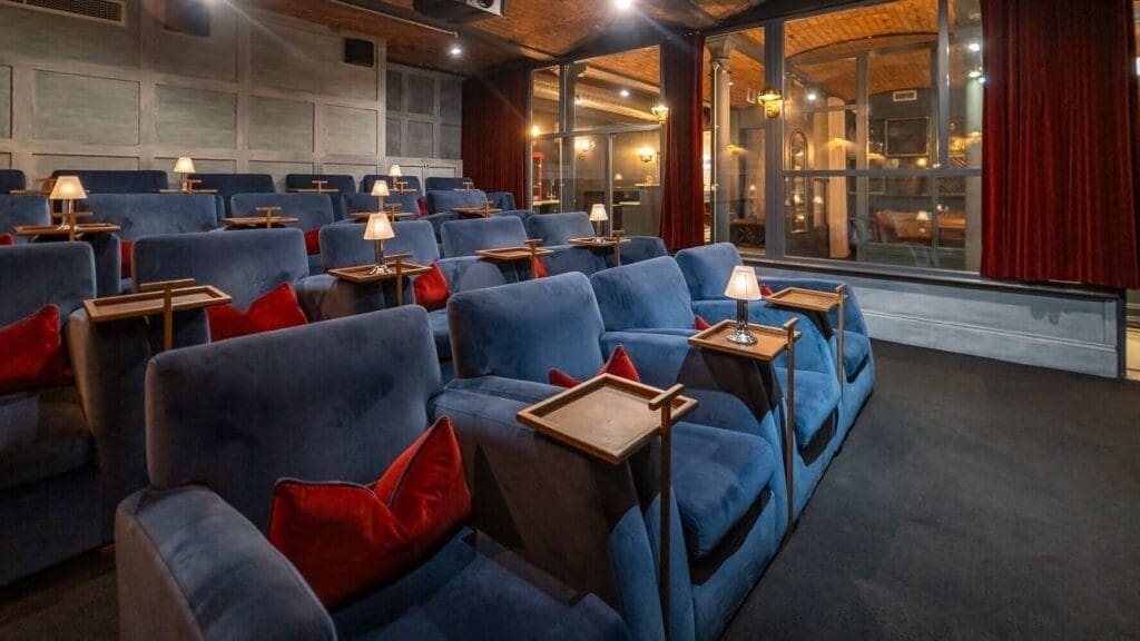 Cinema at King Street Townhouse Manchester with plush seats, classic detailing and warm lighting for a luxe hen stay
