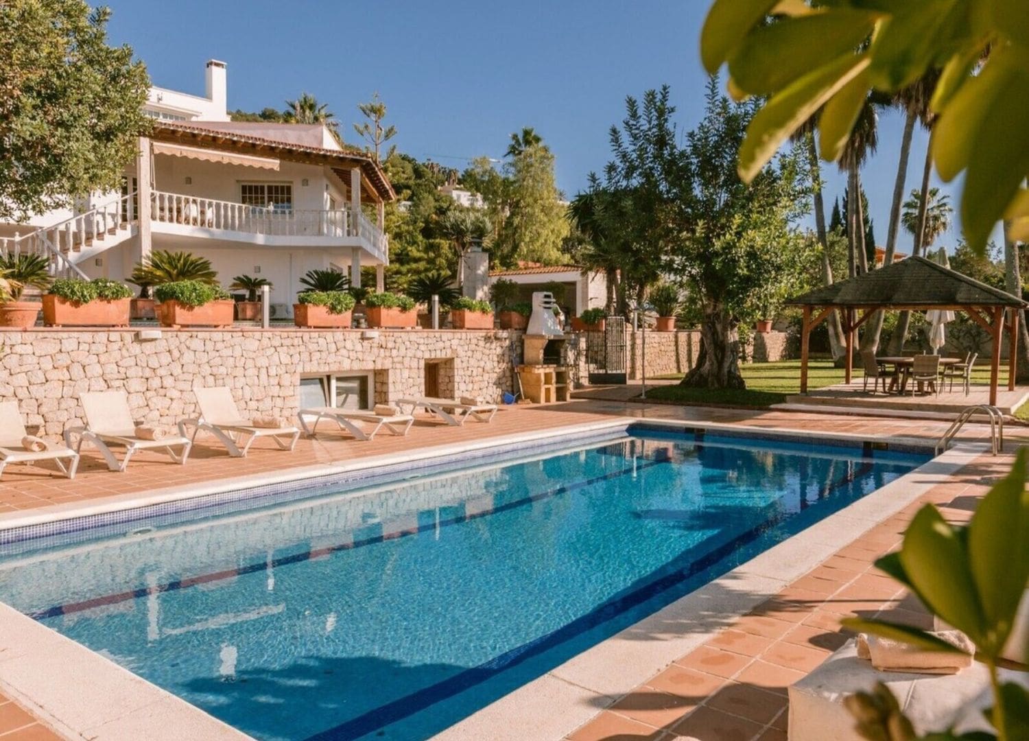 Bohemian villa with Moroccan courtyard, plunge pool and layered outdoor spaces in Airbnbs in Ibiza for a hen weekend.