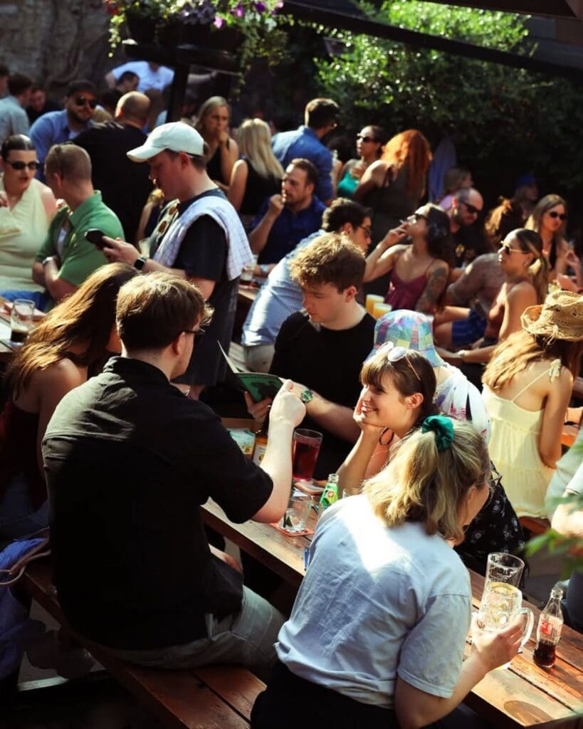 Busy outdoor terrace at Bonobo in Dublin, with groups drinking in the sunshine and a relaxed beer garden atmosphere for a girls’ night out in Dublin.