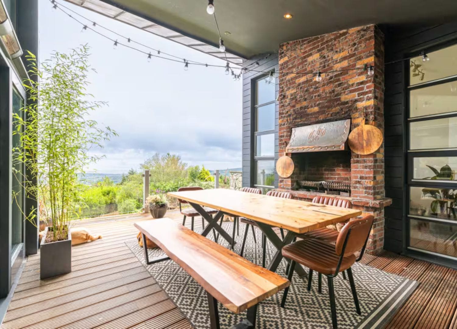 Chalet-style retreat with panoramic city views, open fire and cosy living space in Airbnbs in Dublin for a hen weekend in the mountains.