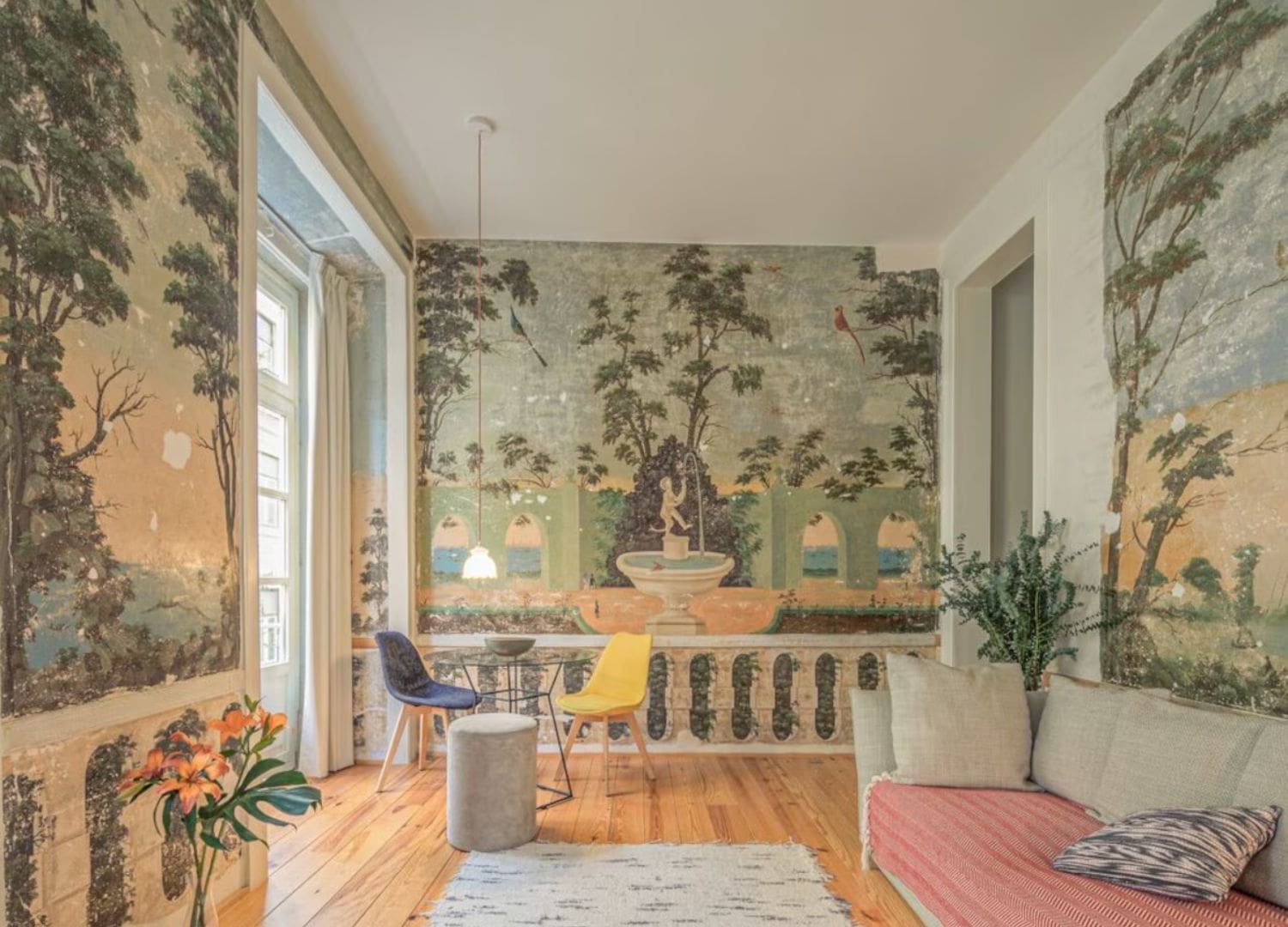 Refined apartment with period details, balconies and polished living space in Airbnbs in Lisbon for a hen weekend.