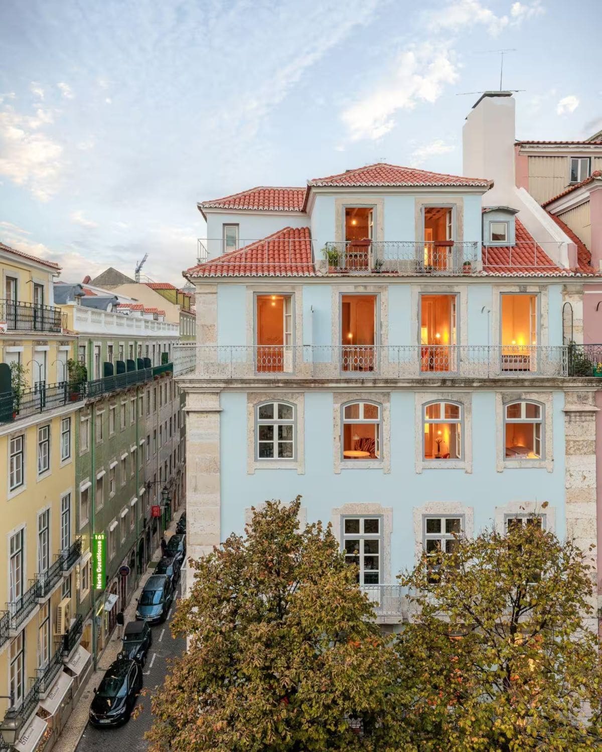 Eclectic apartment with multiple terraces, colourful interiors and open living space in Airbnbs in Lisbon for a hen weekend.