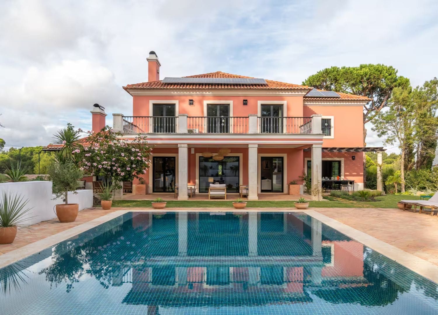 Stylish villa with pool, outdoor bar and bright modern rooms in Airbnbs in Lisbon for a hen weekend near Cascais.