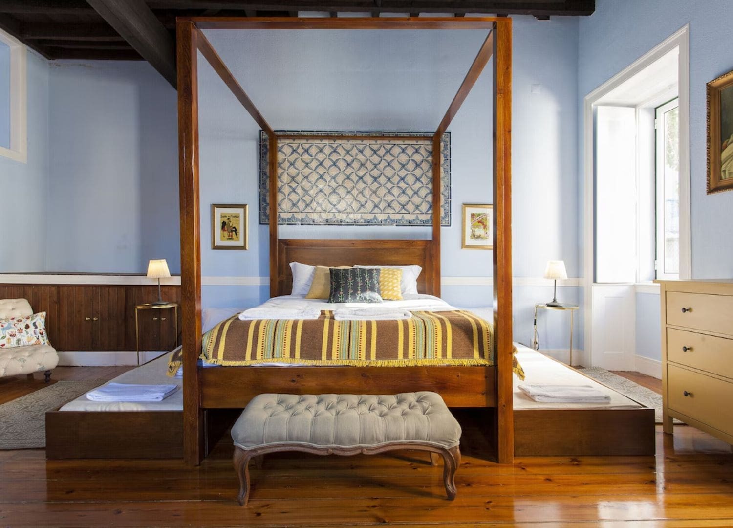 Large city apartment with sunny terrace, wooden floors and light-filled rooms in Airbnbs in Lisbon for a hen weekend near Chiado.