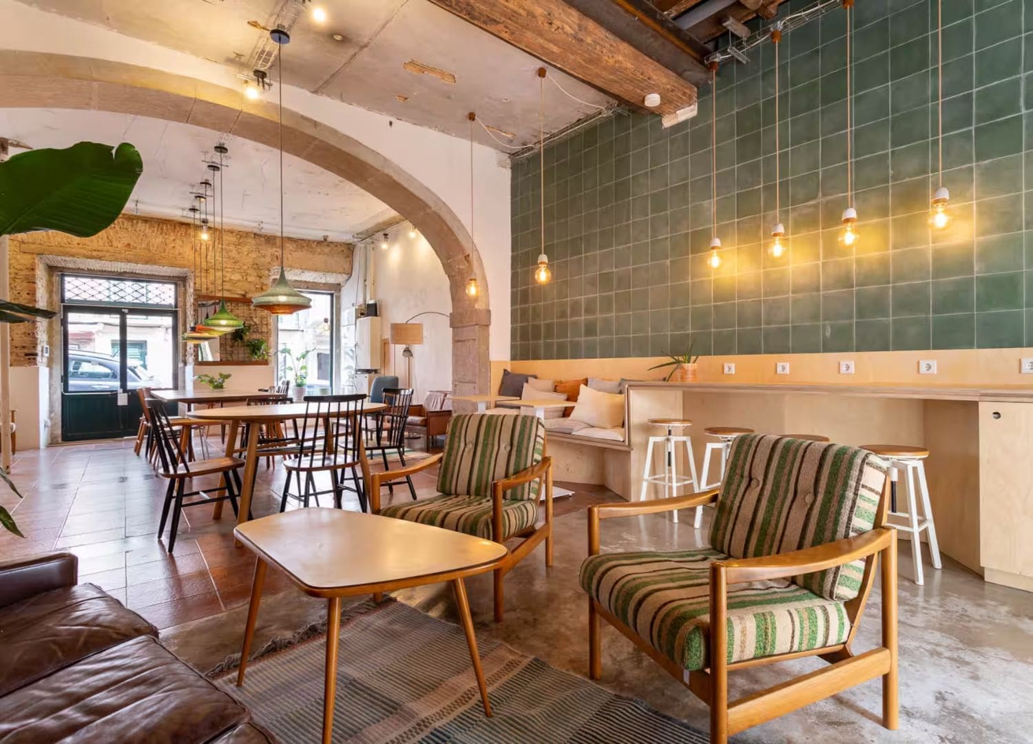 Bold pink townhouse with en-suite bedrooms, sunny garden and grand group layout in Airbnbs in Lisbon for a hen weekend.