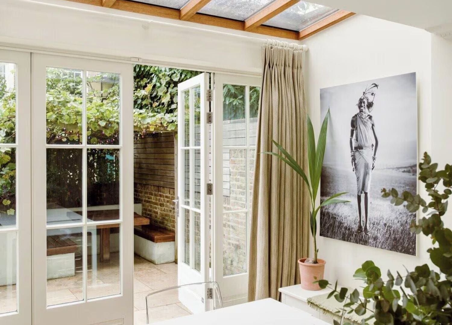 Charming townhouse with roof terrace and bright living spaces in Airbnbs in London for a hen weekend in Notting Hill.