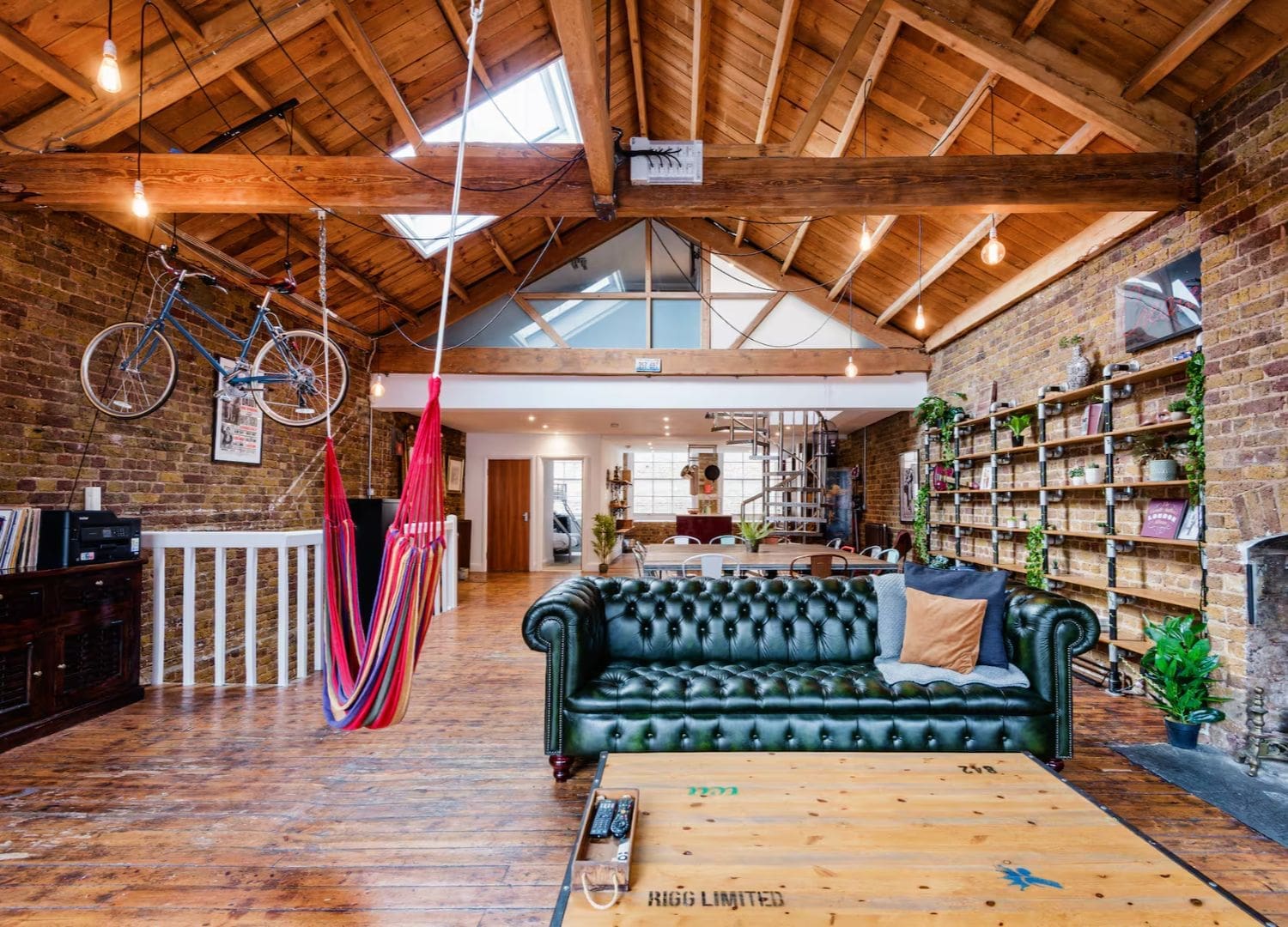 Warehouse-style loft with open-plan sleeping spaces and lively Shoreditch setting in Airbnbs in London for a hen weekend.