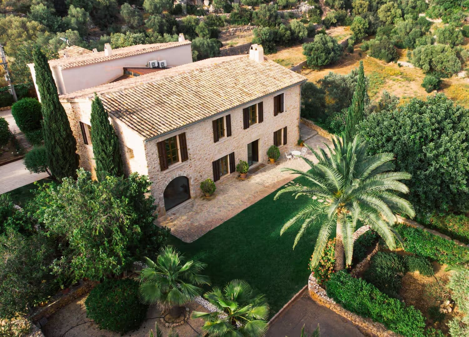Modern villa with infinity pool overlooking hills and sun-soaked terrace in Airbnbs in Mallorca for a hen weekend near Palma.