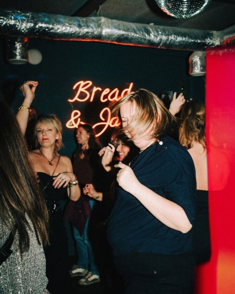 Intimate late-night setting at Bread & Jam in Bath, a tucked-away cocktail bar for stylish drinks on a girls’ night or hen weekend.