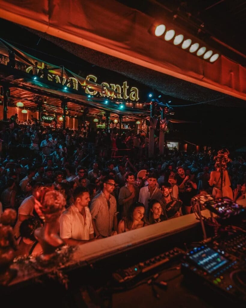 Stylish outdoor party setting at Cova Santa in Ibiza, a late-night dining, music and dancing spot for girls’ trips and hen weekends.