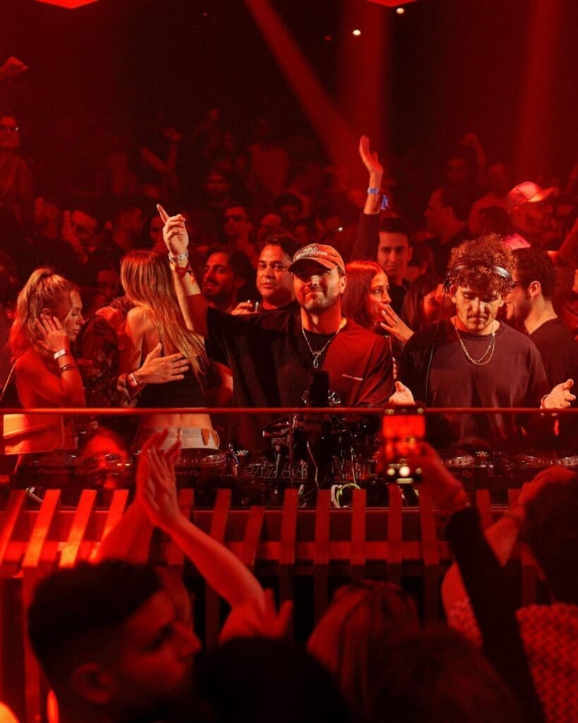 Crowded club scene at Pacha in Ibiza, one of the island’s most iconic places to go out-out on a girls’ trip or hen weekend.