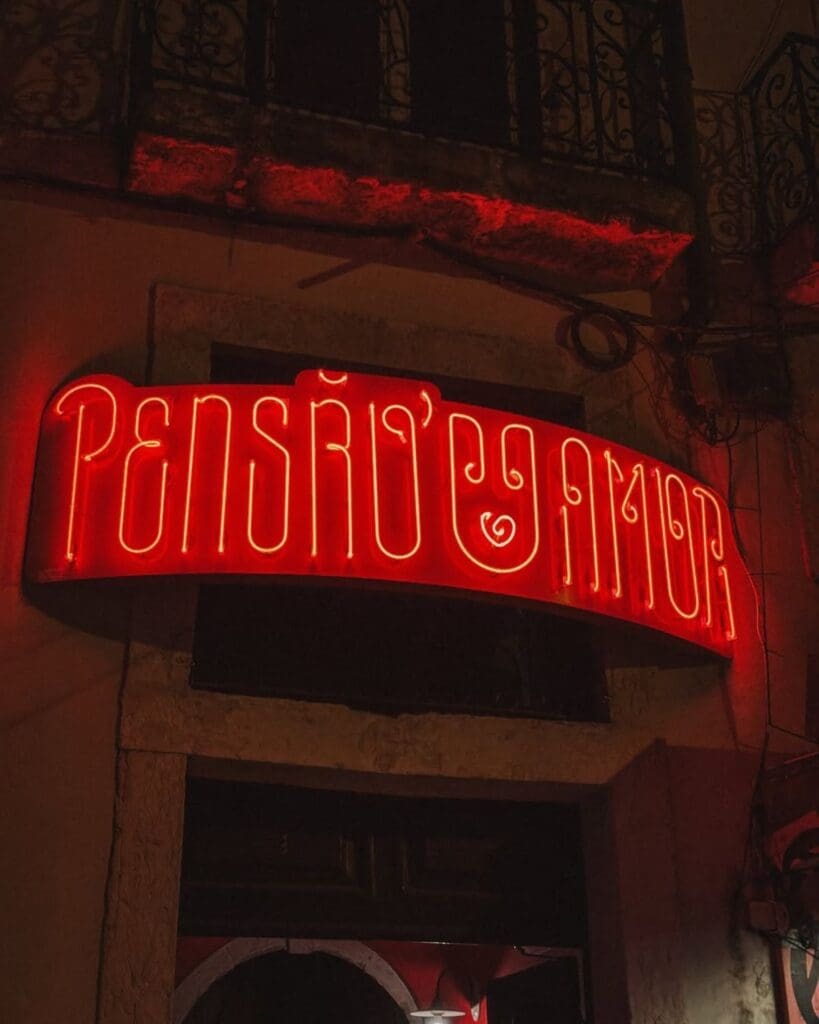 Characterful bar setting at Pensao Amor in Lisbon, a playful nightlife spot for cocktails and a me