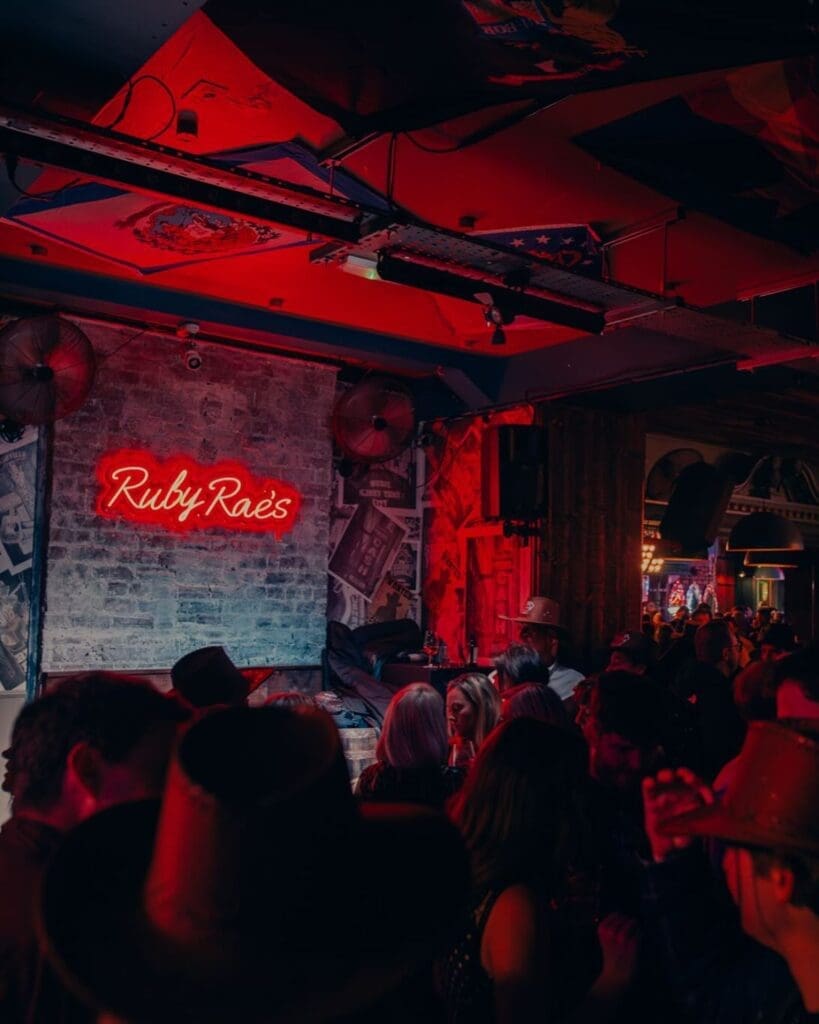 Lively late-night atmosphere at Ruby Raes in Newcastle, a popular bar for cocktails, dancing and going out-out on a girls’ night or hen weekend.