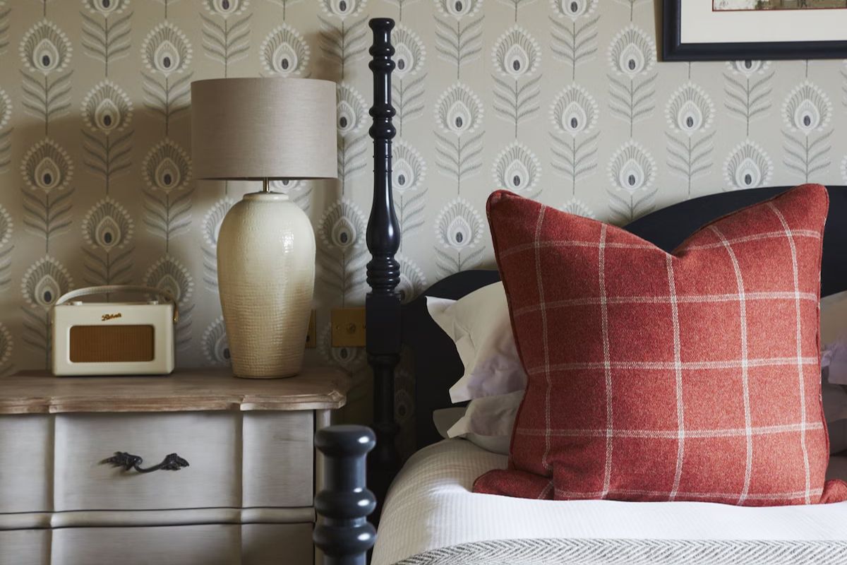 Bedroom detail at The Roseate Edinburgh, an Edinburgh hen weekend hotel with patterned wallpaper, tartan accents and classic Scottish styling.