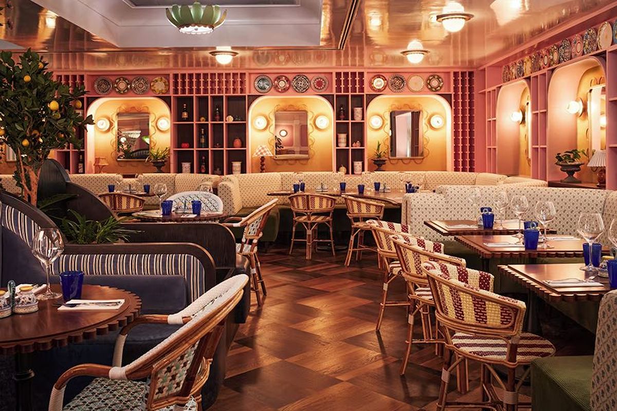 Colourful restaurant at The Hoxton Edinburgh, an Edinburgh hen weekend hotel with warm lighting, patterned seating and stylish social spaces.