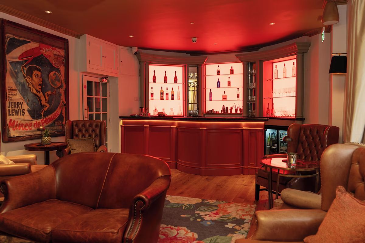 Cosy bar and lounge at Dukes Bath, a stylish Bath hen weekend hotel with traditional interiors.