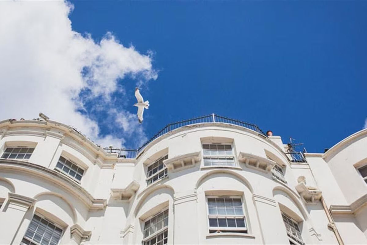 Exterior of Drakes of Brighton, a stylish Brighton hen weekend hotel set along the seafront with classic Regency architecture.