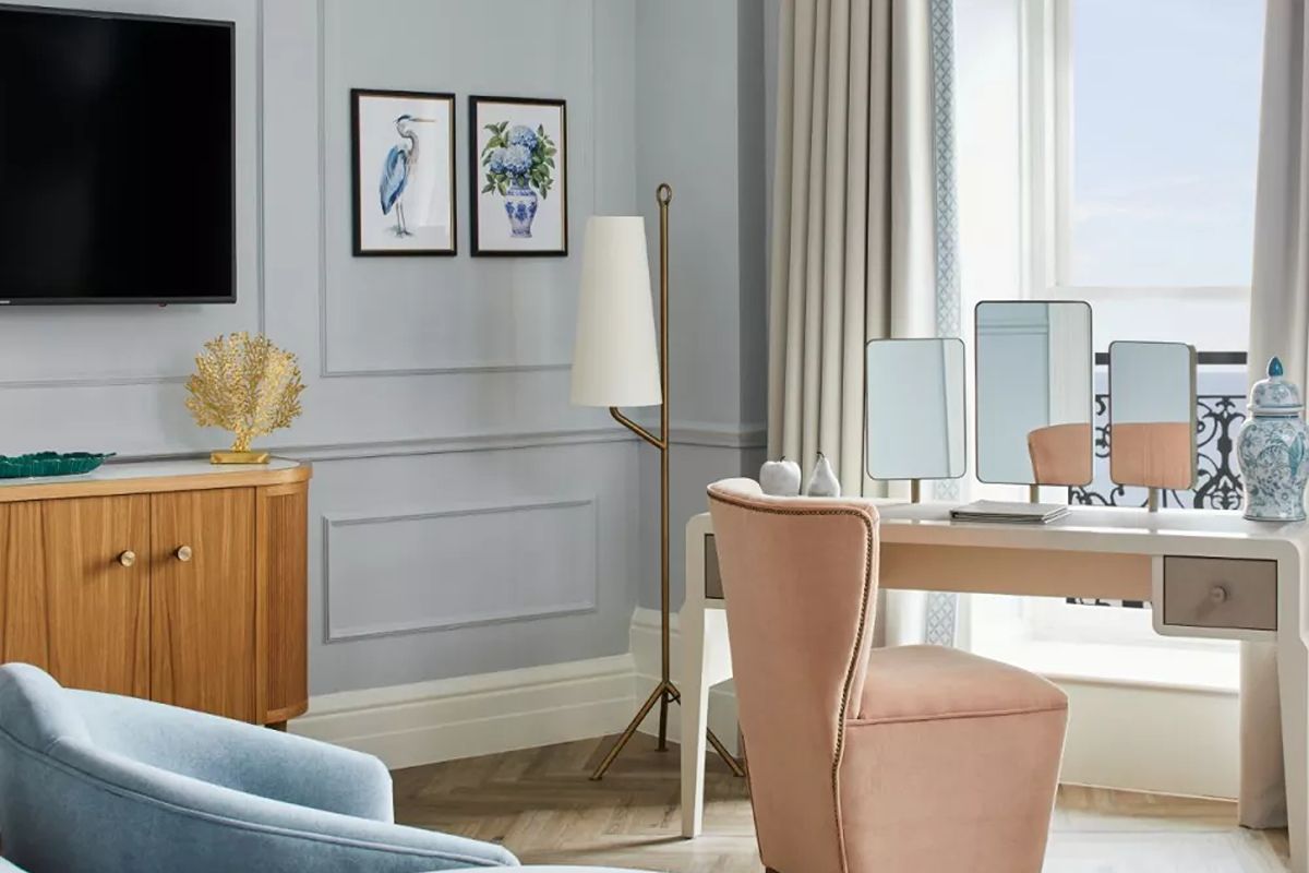 Elegant dressing area at The Grand Brighton, a luxury Brighton hen weekend hotel with soft pastel interiors, vanity mirrors and sea views.