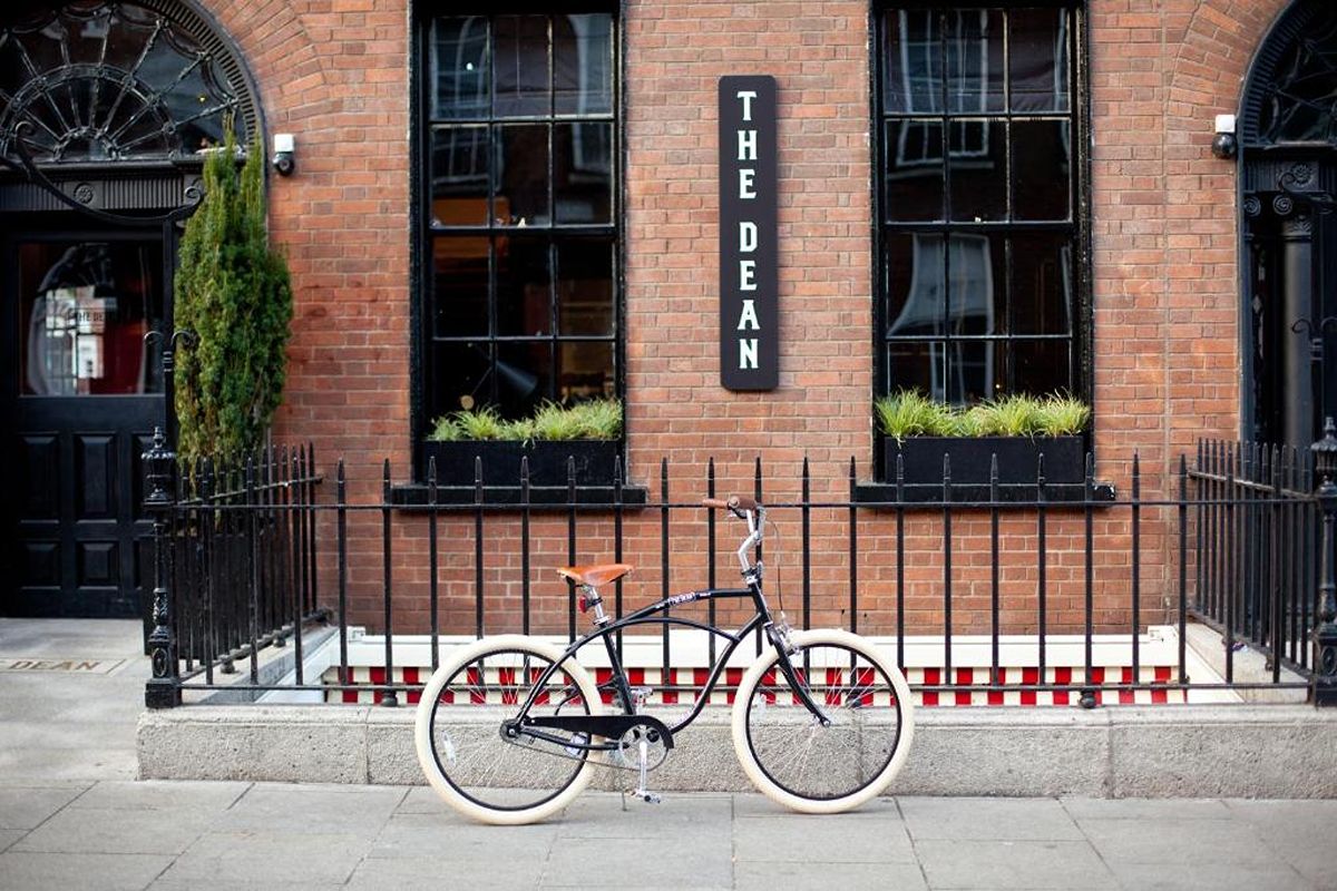 Exterior of The Dean Dublin on Harcourt Street, a central Dublin hen weekend hotel in a red-brick Georgian building.