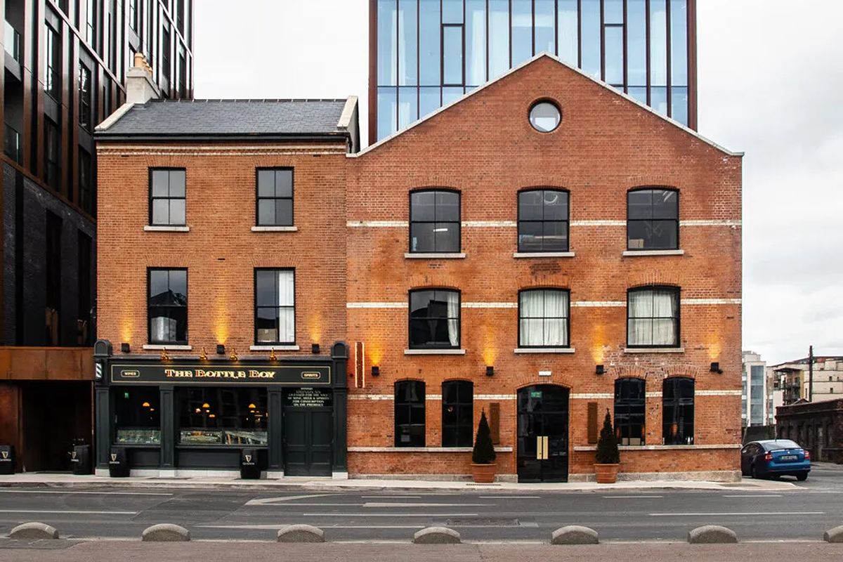 Exterior of The Dean Docklands, a contemporary Dublin hotel for hen weekends set in a characterful red-brick building near the Docklands.