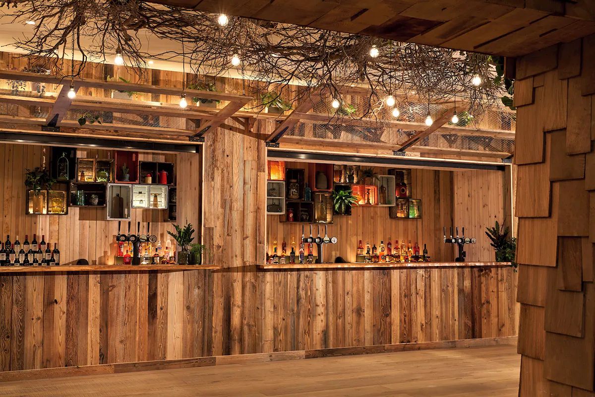 Rustic bar at Treehouse Hotel Manchester.